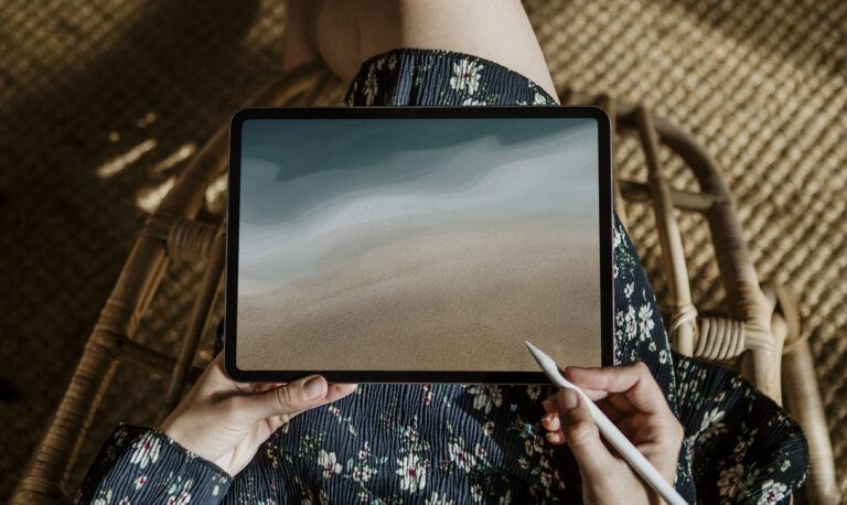 Blank drawing tablet screen with dark blue ocean background