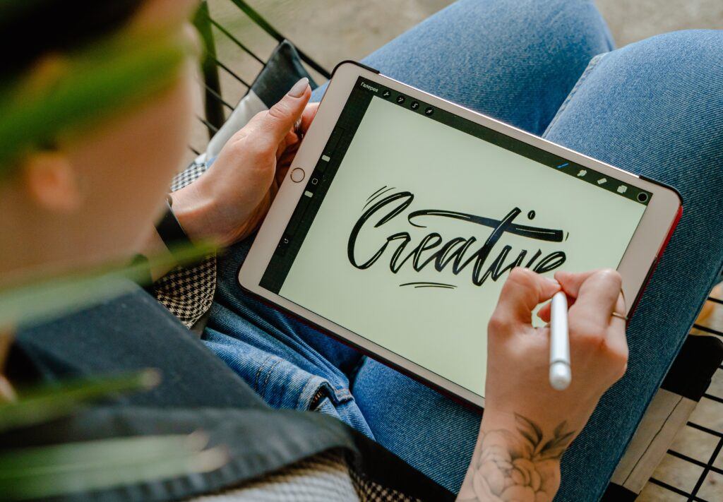 procreate for lettering - person creating letters on procreate